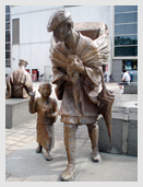 Statue of a medicine peddler in front of JR Toyama Station